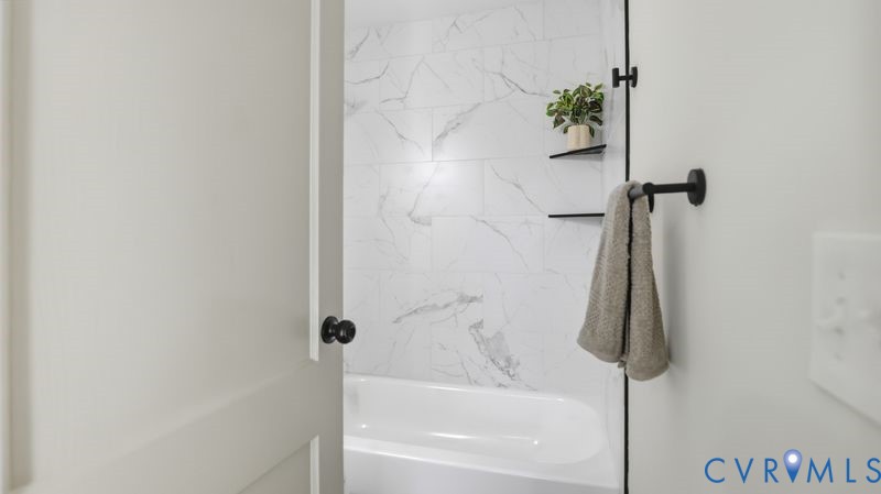 331 Walnut Street Petersburg, VA 23803 - Photo 14 of 34 a bathroom with a shower