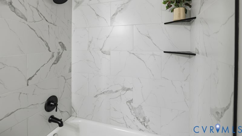 331 Walnut Street Petersburg, VA 23803 - Photo 16 of 34 a bathroom with a shower