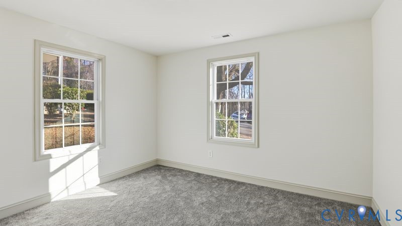 331 Walnut Street Petersburg, VA 23803 - Photo 19 of 34 an empty room with windows