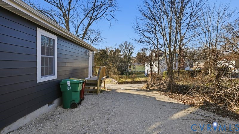 331 Walnut Street Petersburg, VA 23803 - Photo 30 of 34 a view of a house with backyard and sitting area