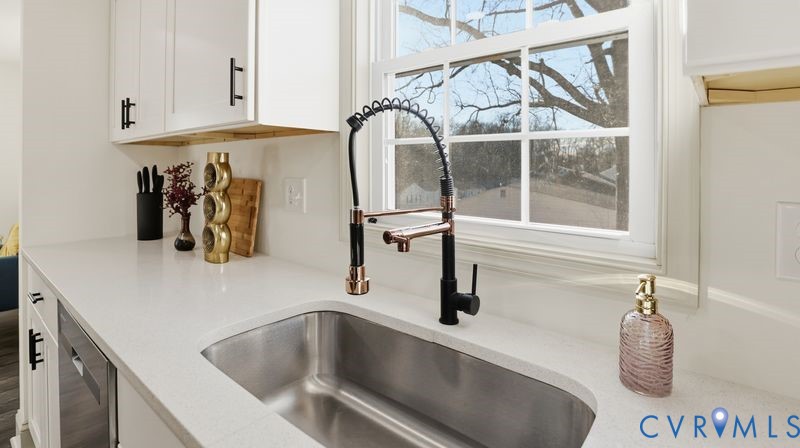 331 Walnut Street Petersburg, VA 23803 - Photo 3 of 34 a kitchen with a sink and a window