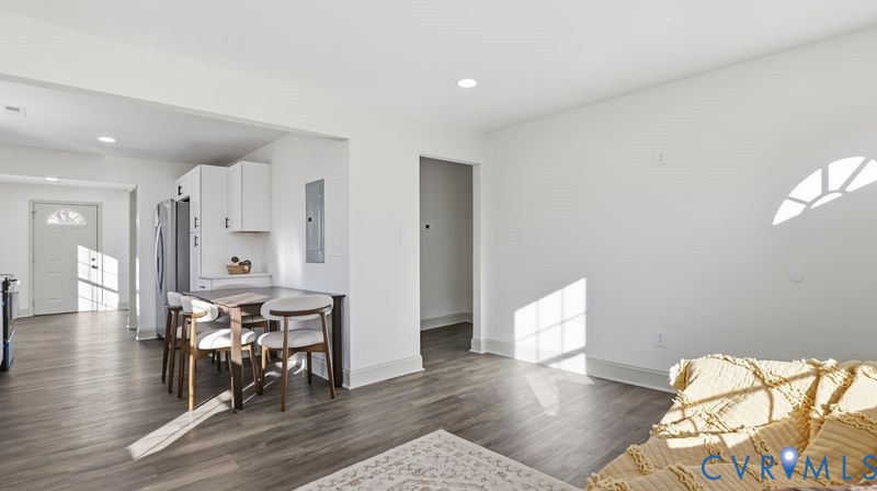 331 Walnut Street Petersburg, VA 23803 - Photo 8 of 34 a living room with furniture and a wooden floor