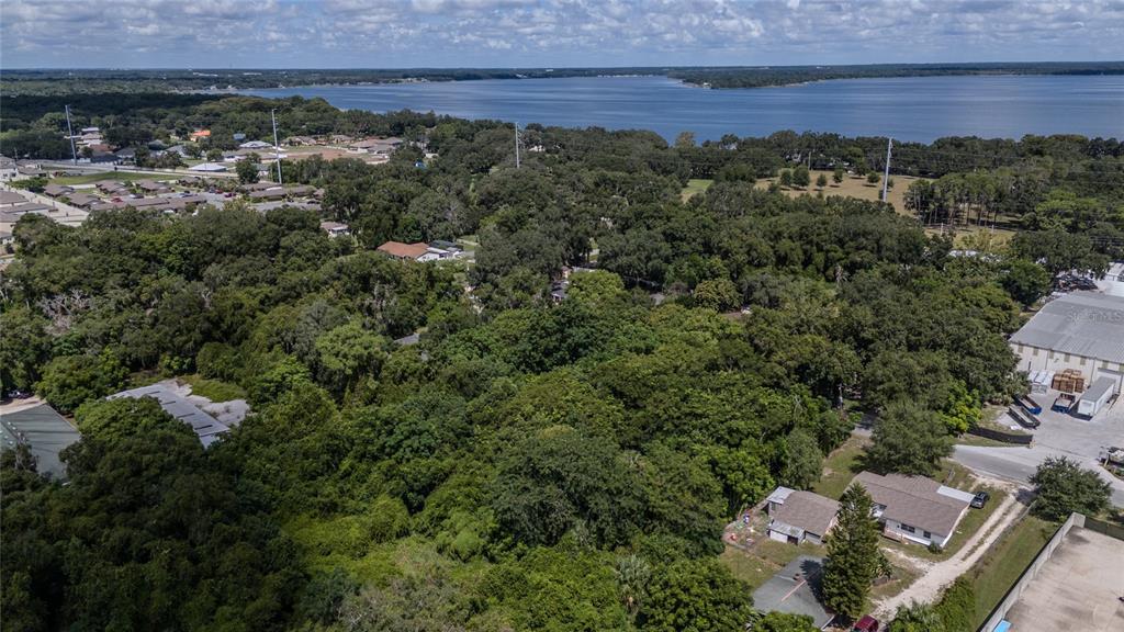 3rd Street Leesburg, FL 34748 - Photo 8 of 14 an aerial view of a house with a yard