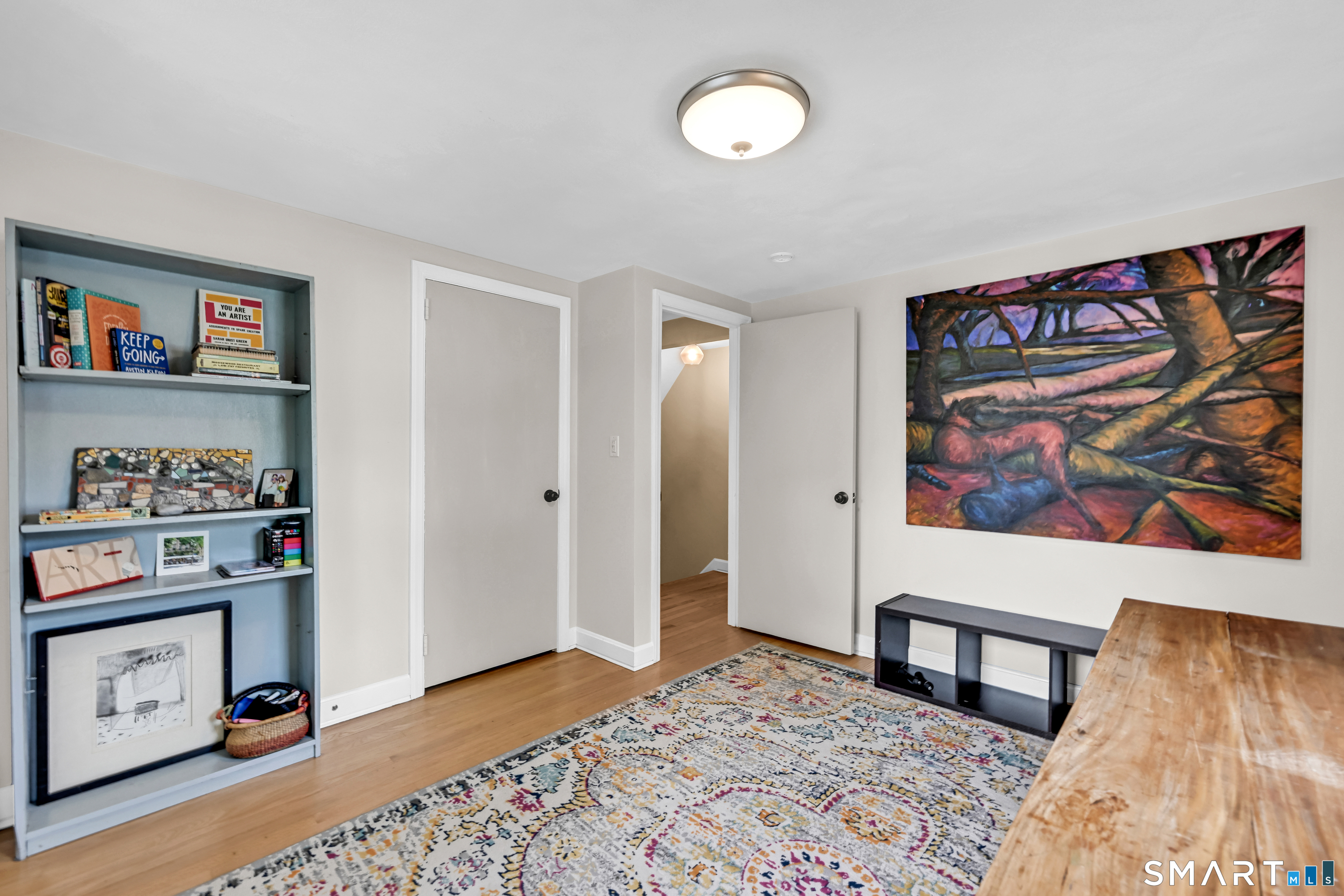 47 Spring Lane West Hartford, CT 06107 - Photo 25 of 38 a bedroom with furniture and painting on the wall