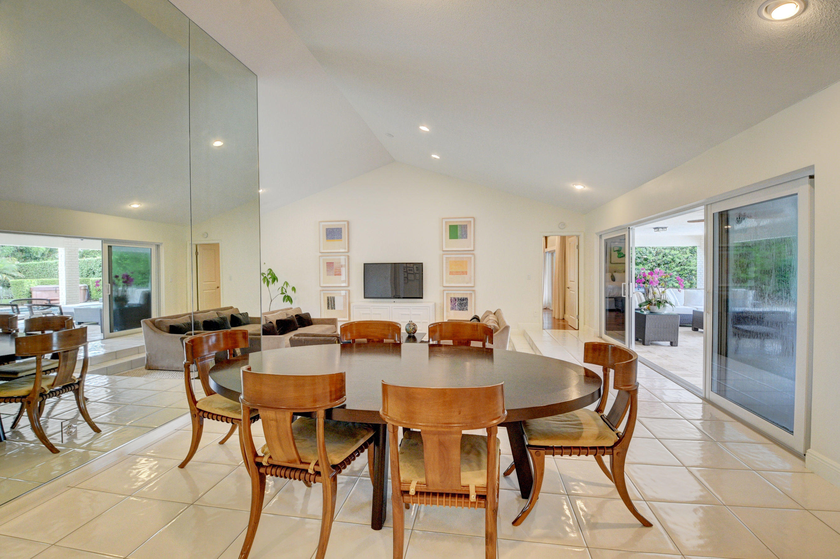 7624 Marbella Terrace Boca Raton, FL 33433 - Photo 13 of 55 a view of a dining room with furniture and wooden floor