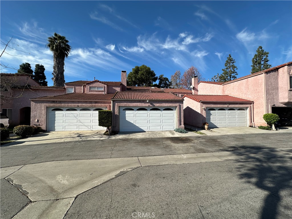 165 Racquet Club Drive Compton, CA 90220 - Photo 2 of 47 a car parked on the side of the road