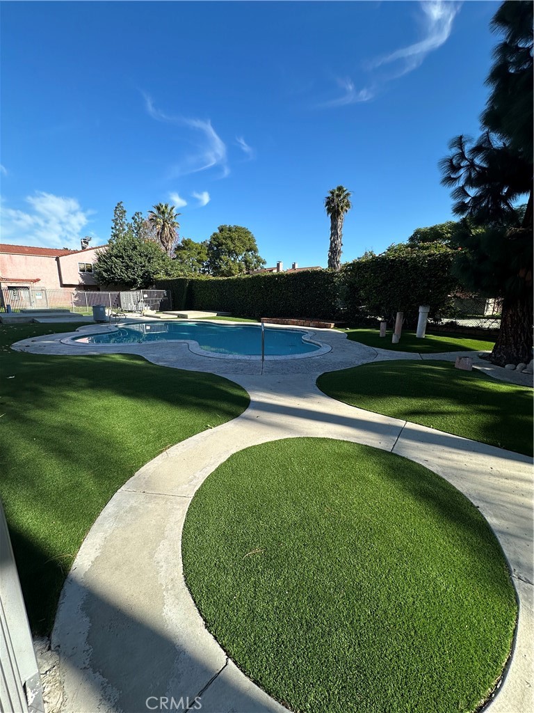165 Racquet Club Drive Compton, CA 90220 - Photo 42 of 47 a view of a swimming pool and outdoor space