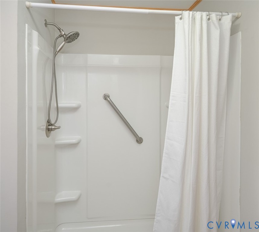 13124 Old Happy Hill Road Chester, VA 23831 - Photo 25 of 64 a bathroom with a shower
