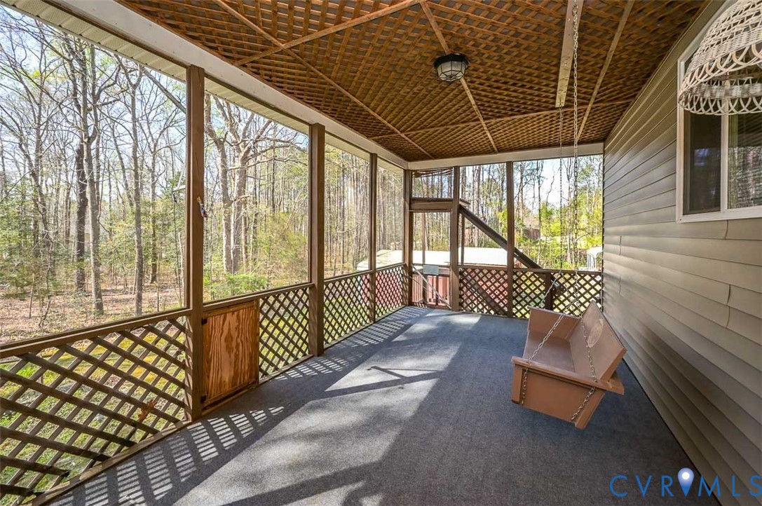 13124 Old Happy Hill Road Chester, VA 23831 - Photo 34 of 64 Screen porch with clever garbage lift to make fill