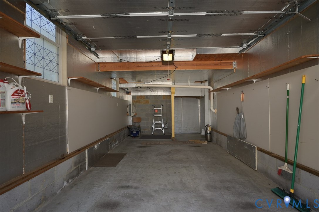 13124 Old Happy Hill Road Chester, VA 23831 - Photo 55 of 64 Garage offering mechanical lift to the main level.