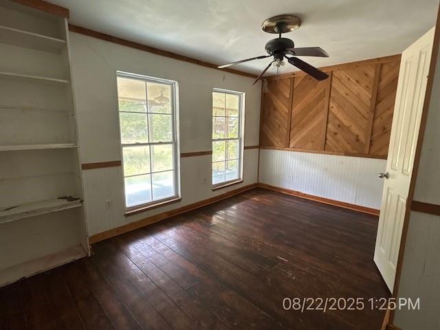 9672 Lakeland Loop Quinlan, TX 75474 - Photo 12 of 12 a view of an empty room with wooden floor and a window
