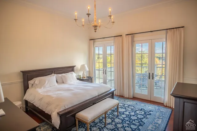 a spacious bathroom with a bathtub and sink
