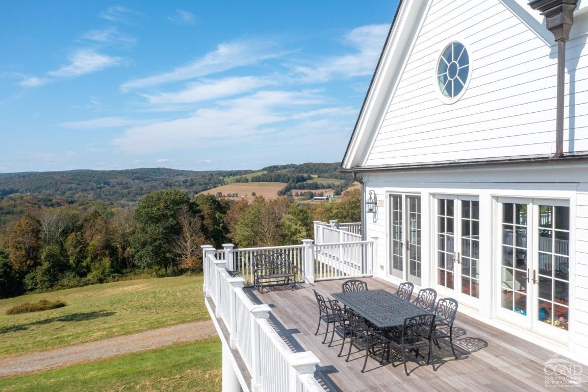 255 Mill Hill Road Gallatin, NY 12567 - Photo 8 of 29 a view of a roof deck with furniture
