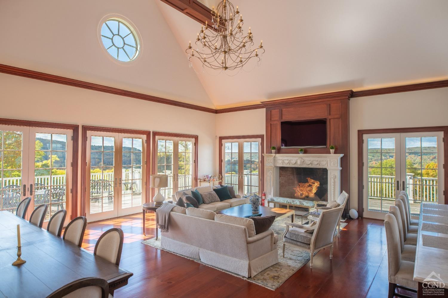 255 Mill Hill Road Gallatin, NY 12567 - Photo 10 of 29 a living room with furniture fireplace and a large window