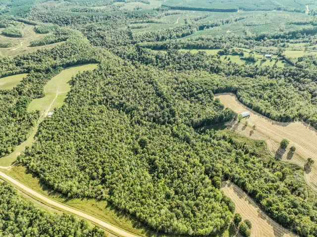 a view of a house with a snow in the yard