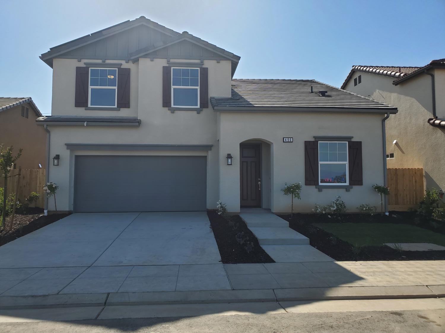 496 Talus Way South Madera, CA 93636 - Photo 2 of 9 a front view of a house