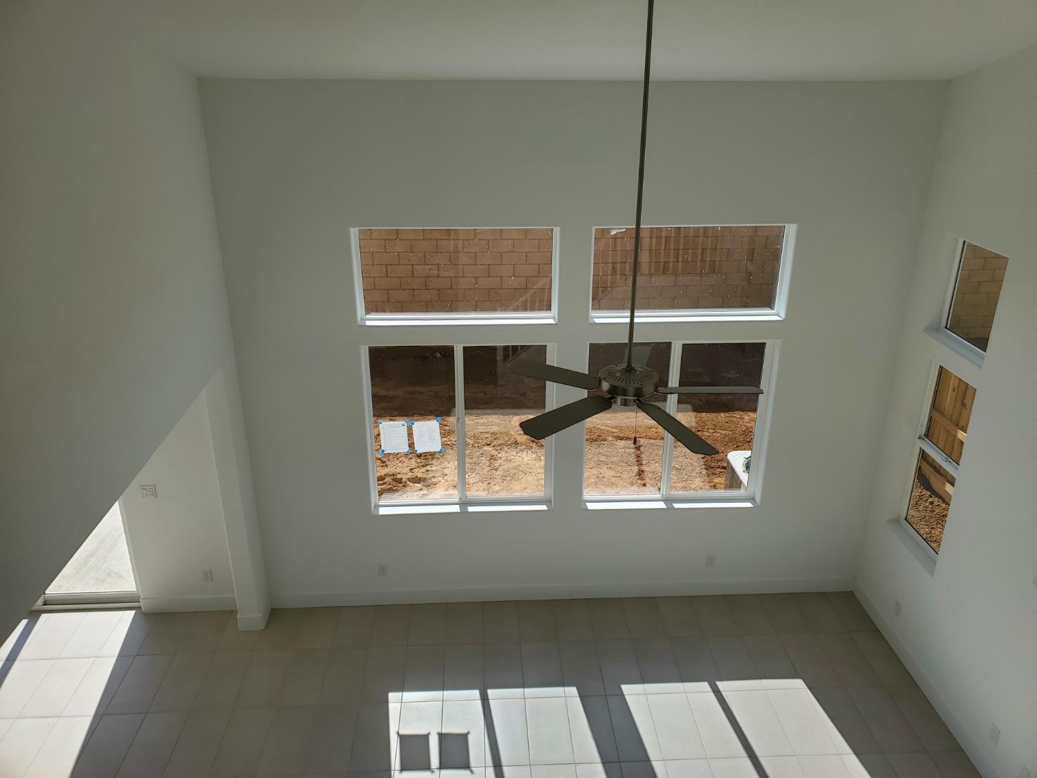 496 Talus Way South Madera, CA 93636 - Photo 6 of 9 a workspace room with a window