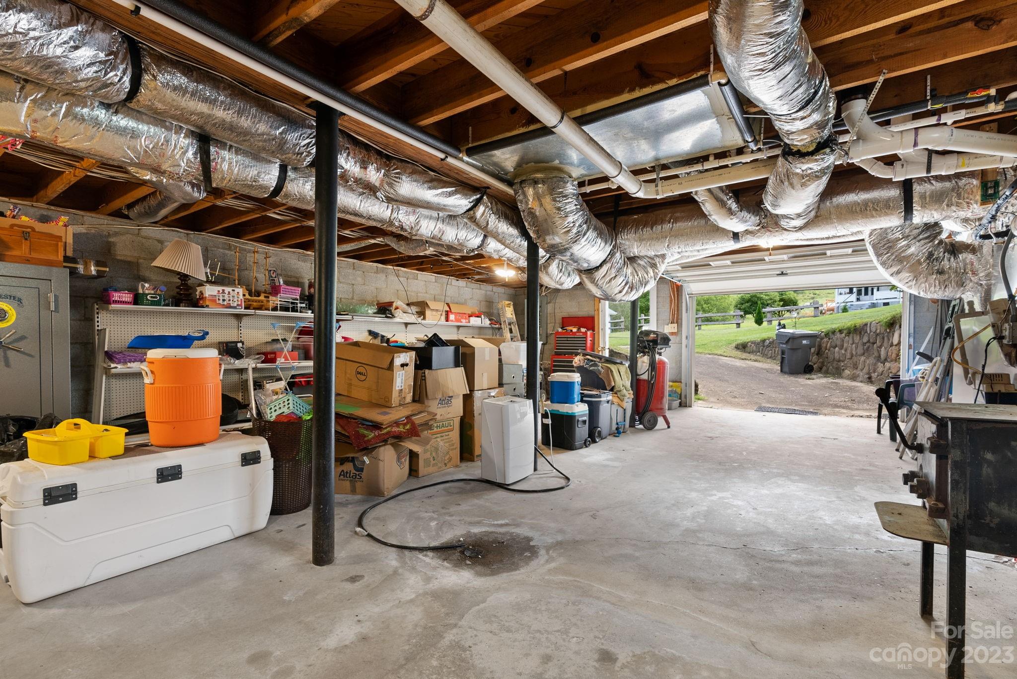 320 Wilson Branch Road Canton, NC 28716 - Photo 16 of 25 a view of a room with storage and utility room