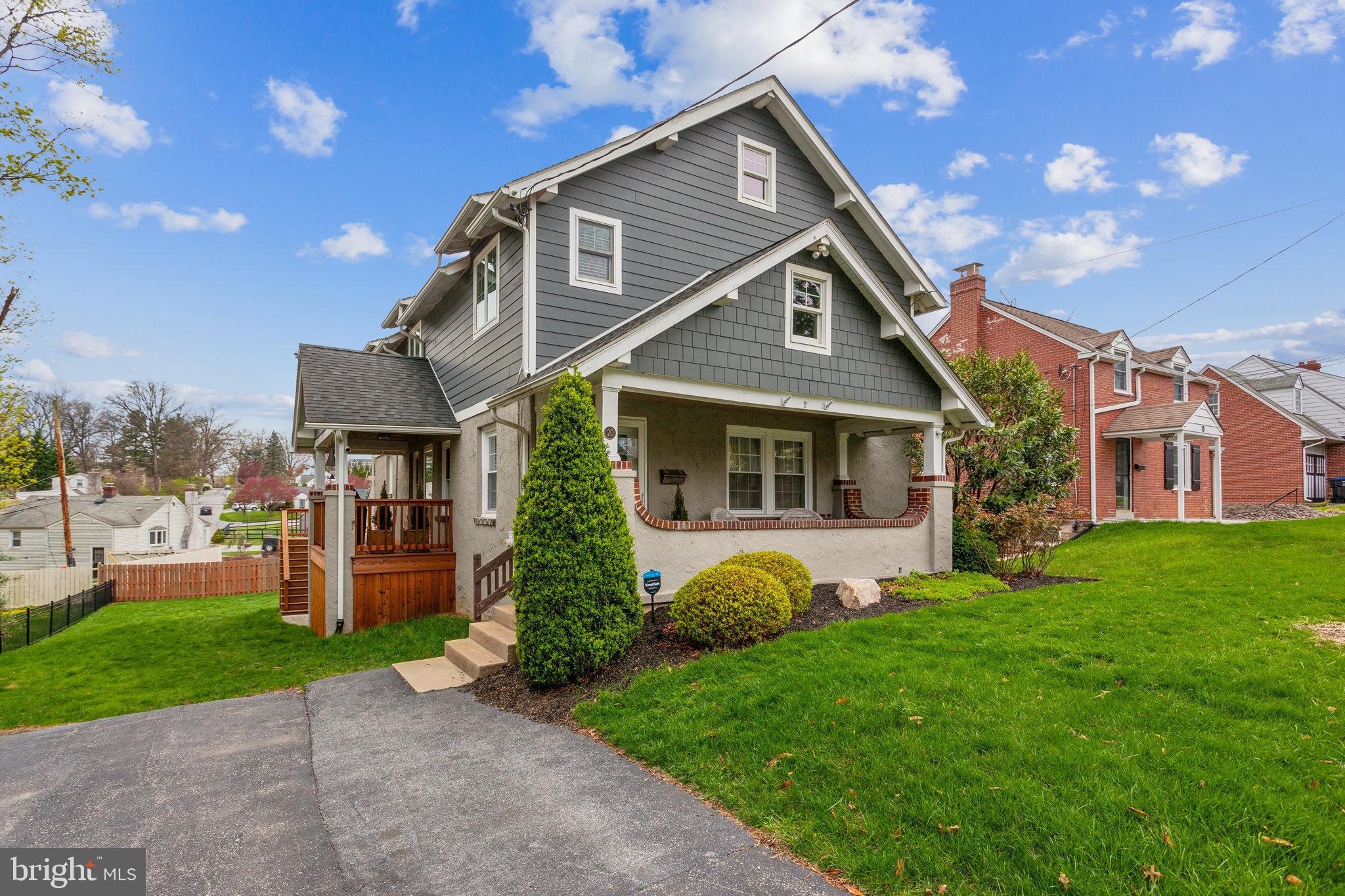 20 Moreland Road Paoli, PA 19301 - Photo 1 of 30 a front view of a house with a yard