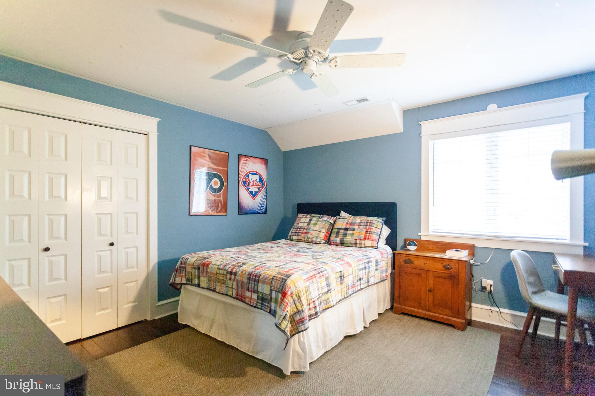 20 Moreland Road Paoli, PA 19301 - Photo 23 of 30 a bedroom with a bed and a table in it