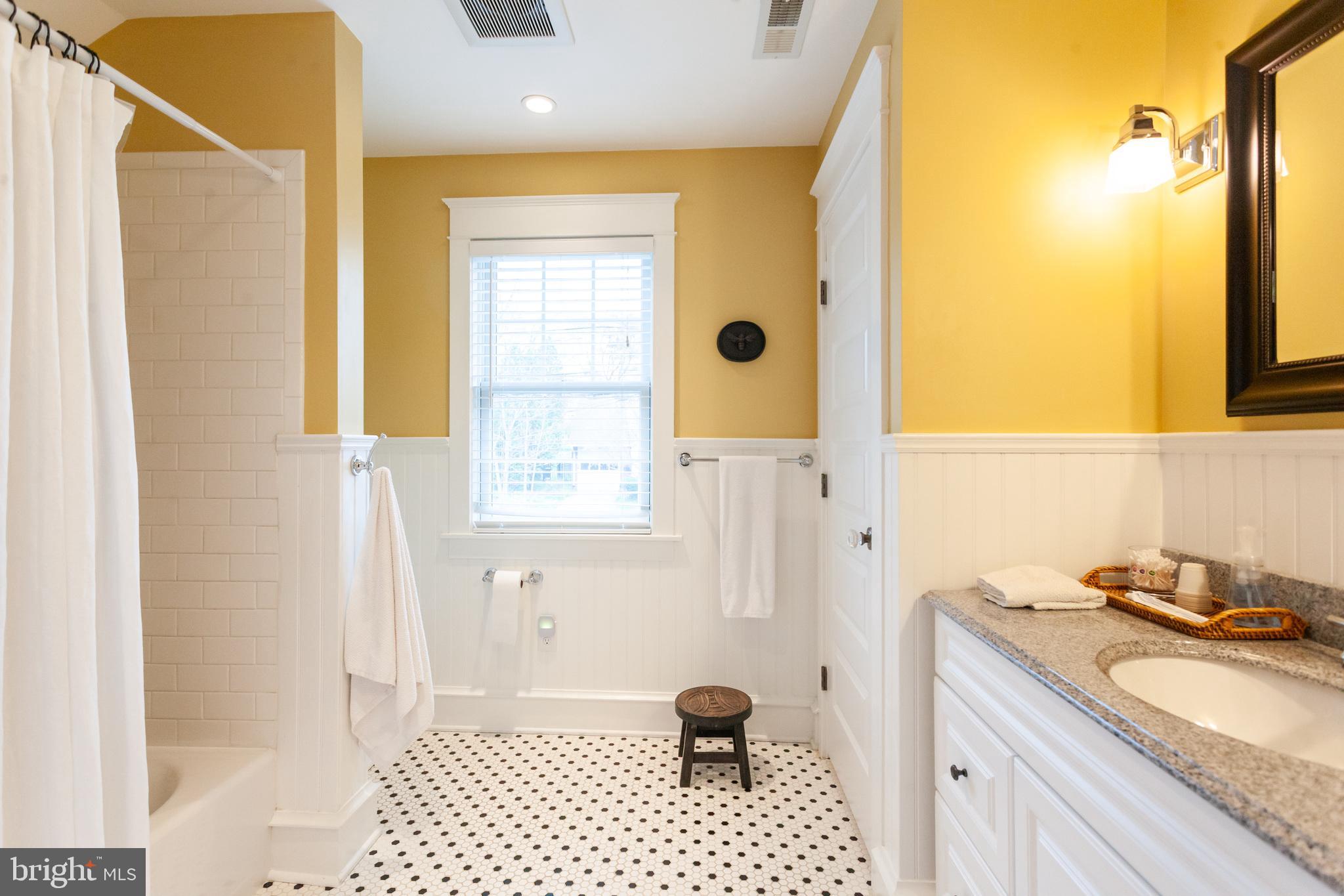 20 Moreland Road Paoli, PA 19301 - Photo 25 of 30 a bathroom with a granite countertop sink a toilet and shower