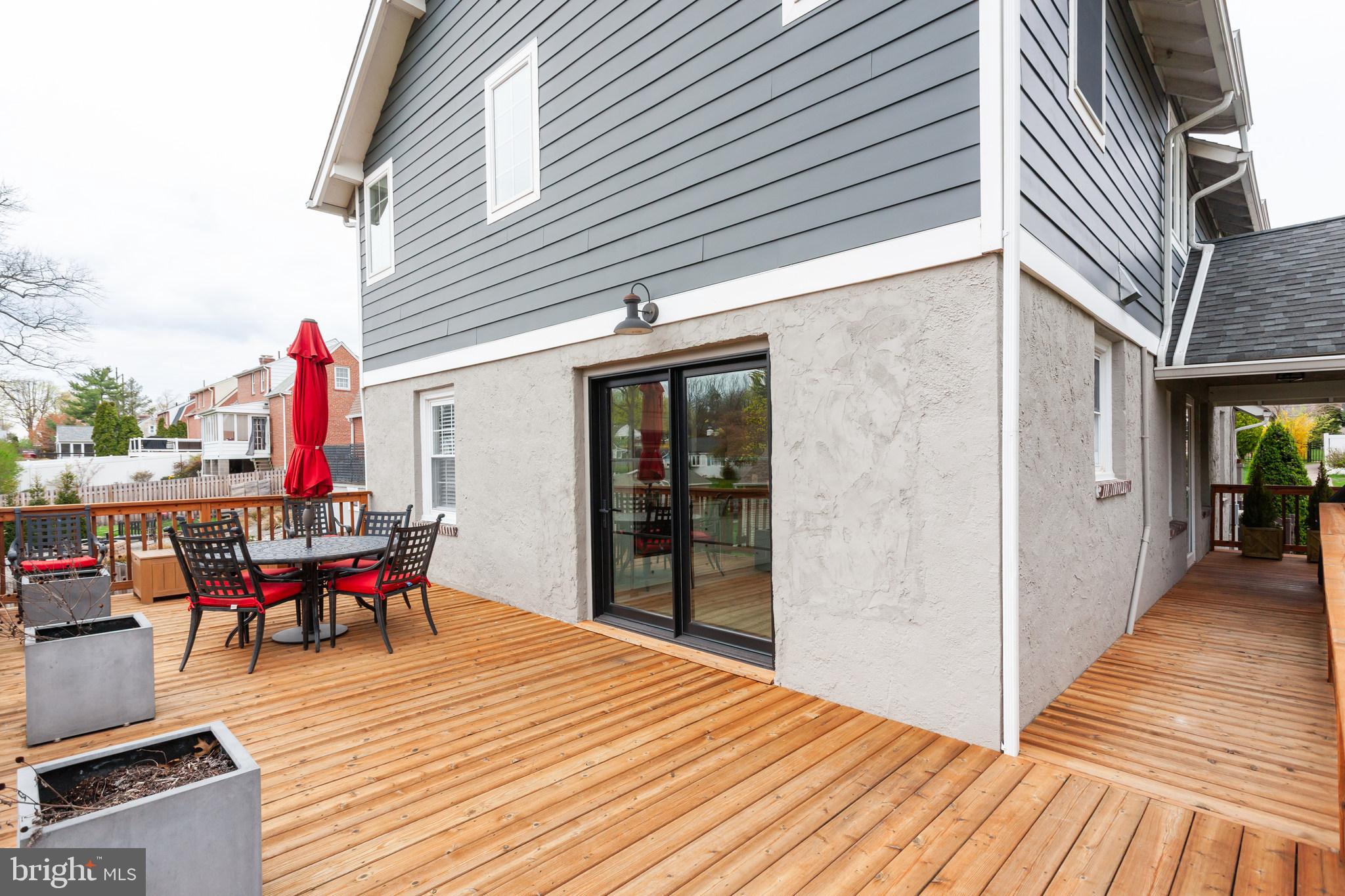 20 Moreland Road Paoli, PA 19301 - Photo 29 of 30 a view of a patio with wooden floor and outdoor seating