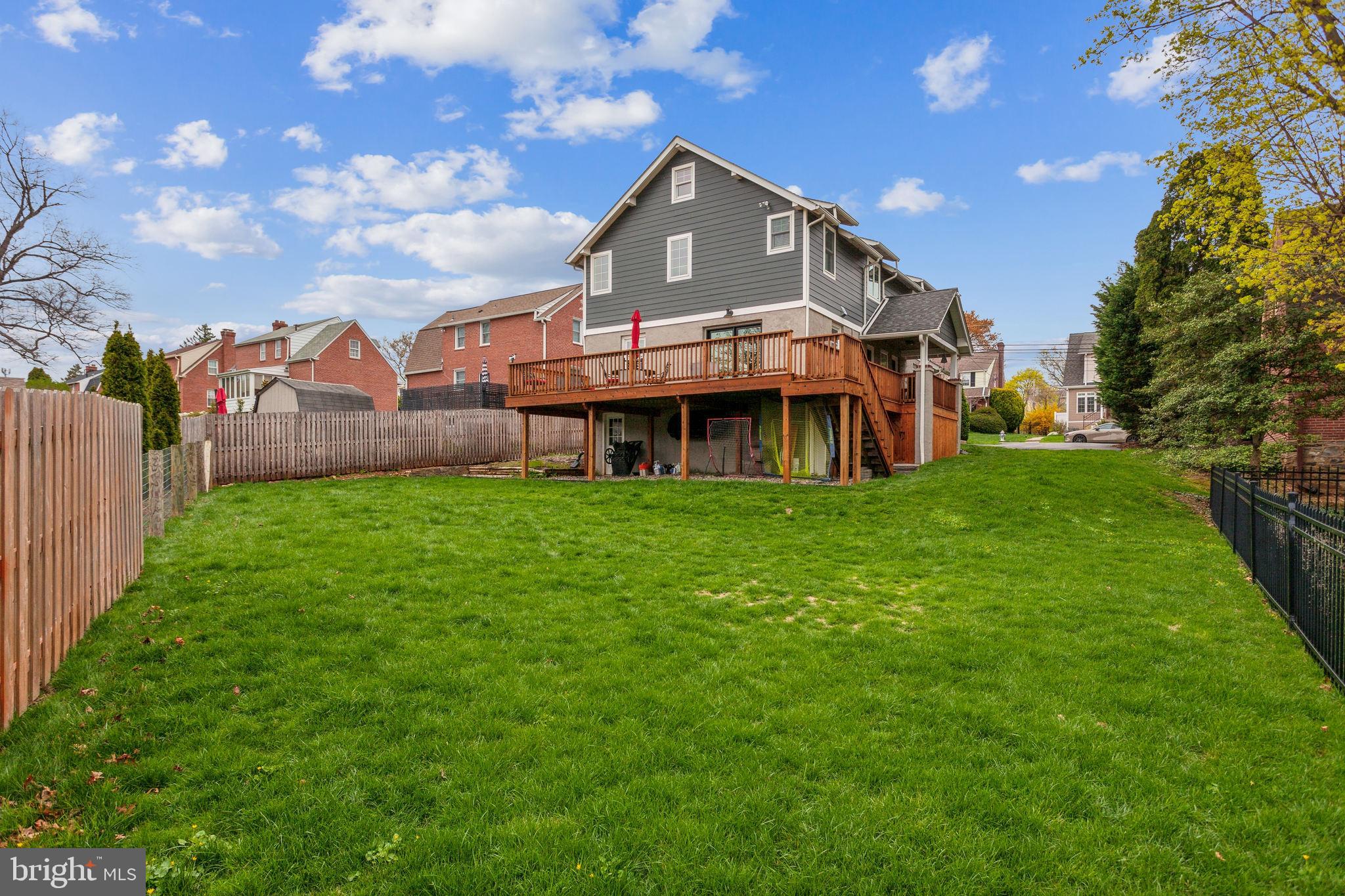 20 Moreland Road Paoli, PA 19301 - Photo 30 of 30 a front view of a house with a garden and deck