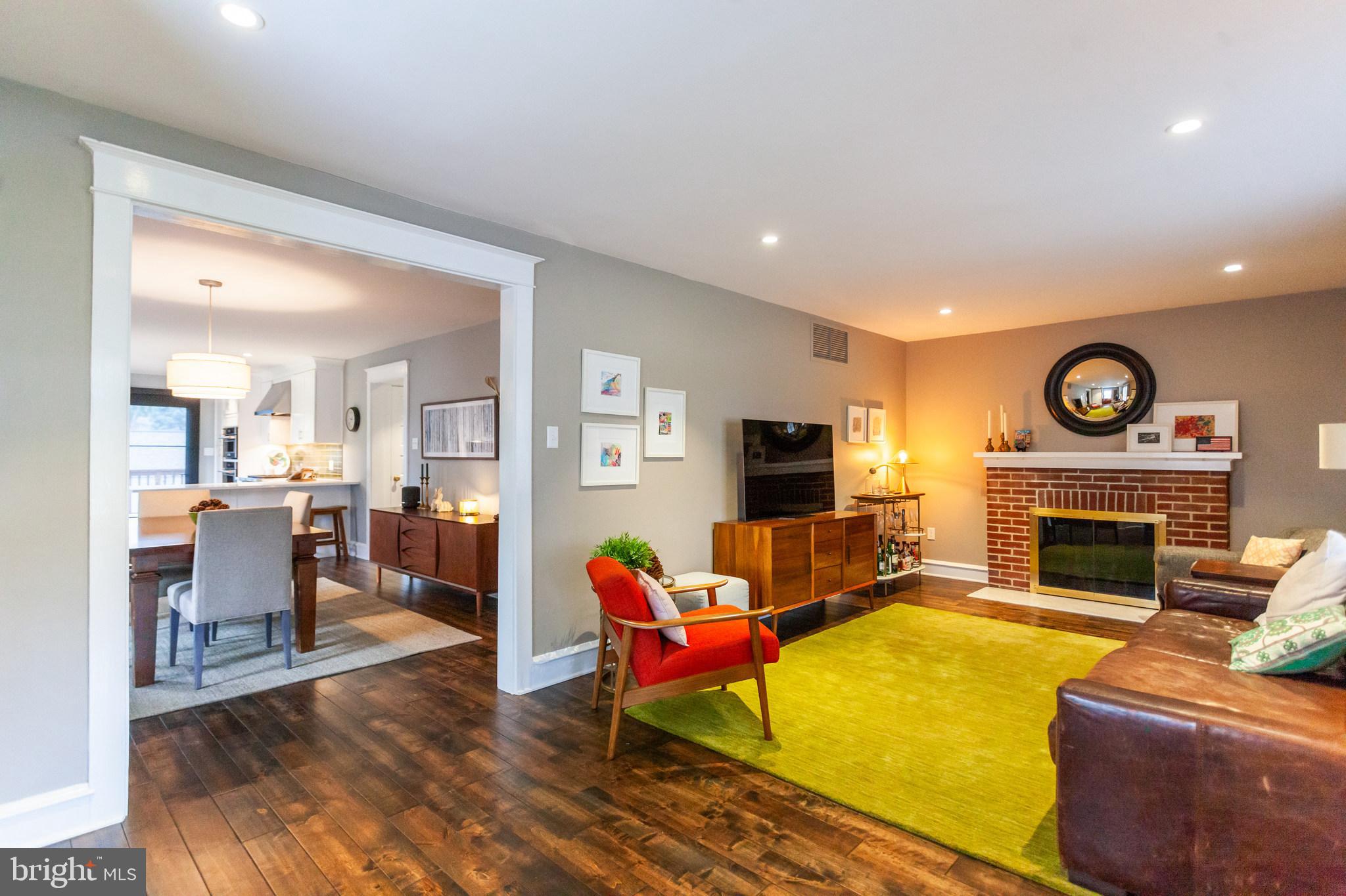 20 Moreland Road Paoli, PA 19301 - Photo 3 of 30 a living room with furniture a fireplace and a flat screen tv