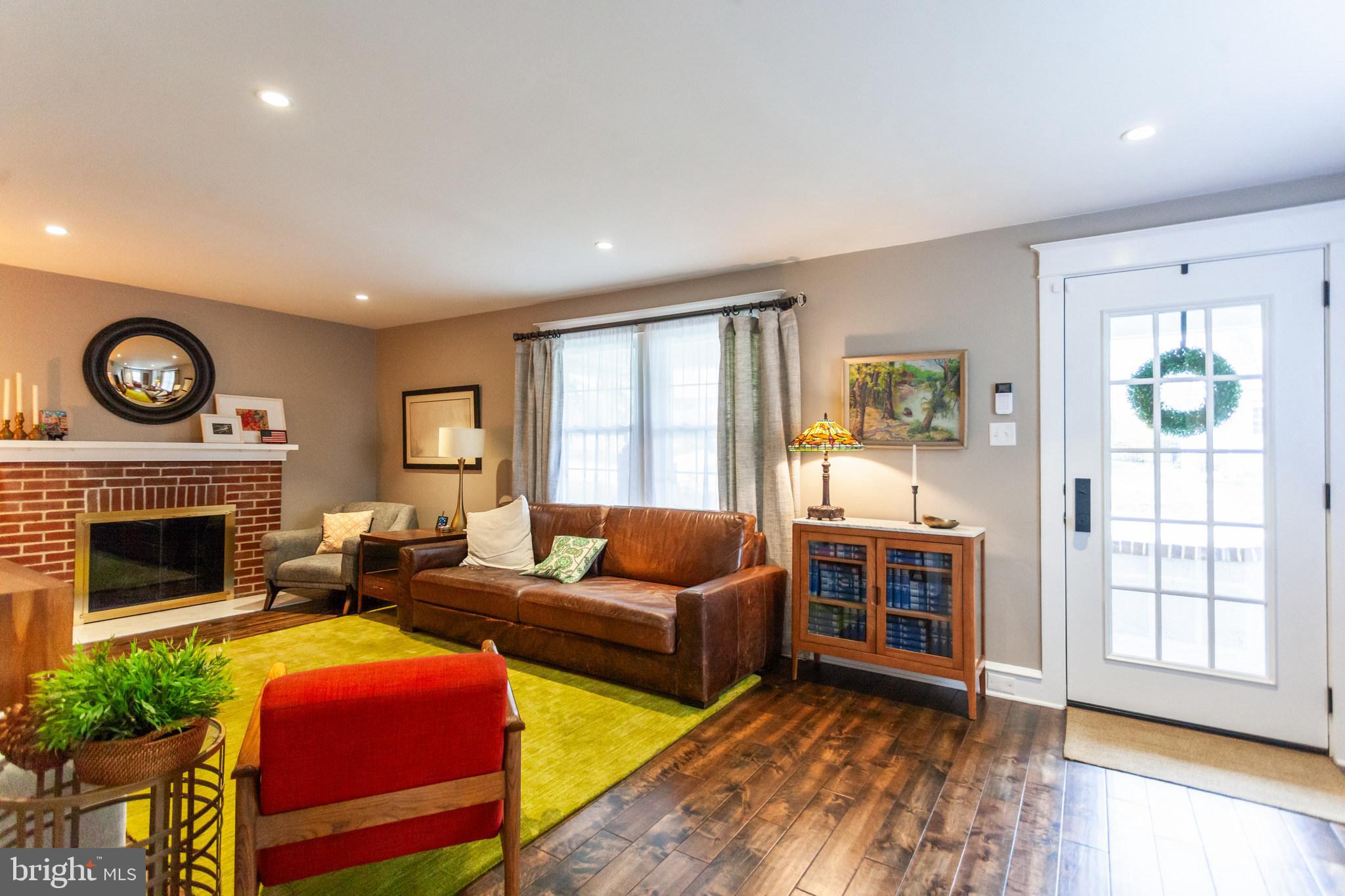 20 Moreland Road Paoli, PA 19301 - Photo 4 of 30 a living room with furniture and a fireplace