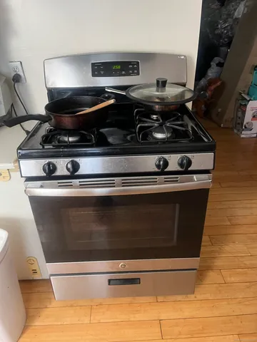 a view of a living room with a refrigerator
