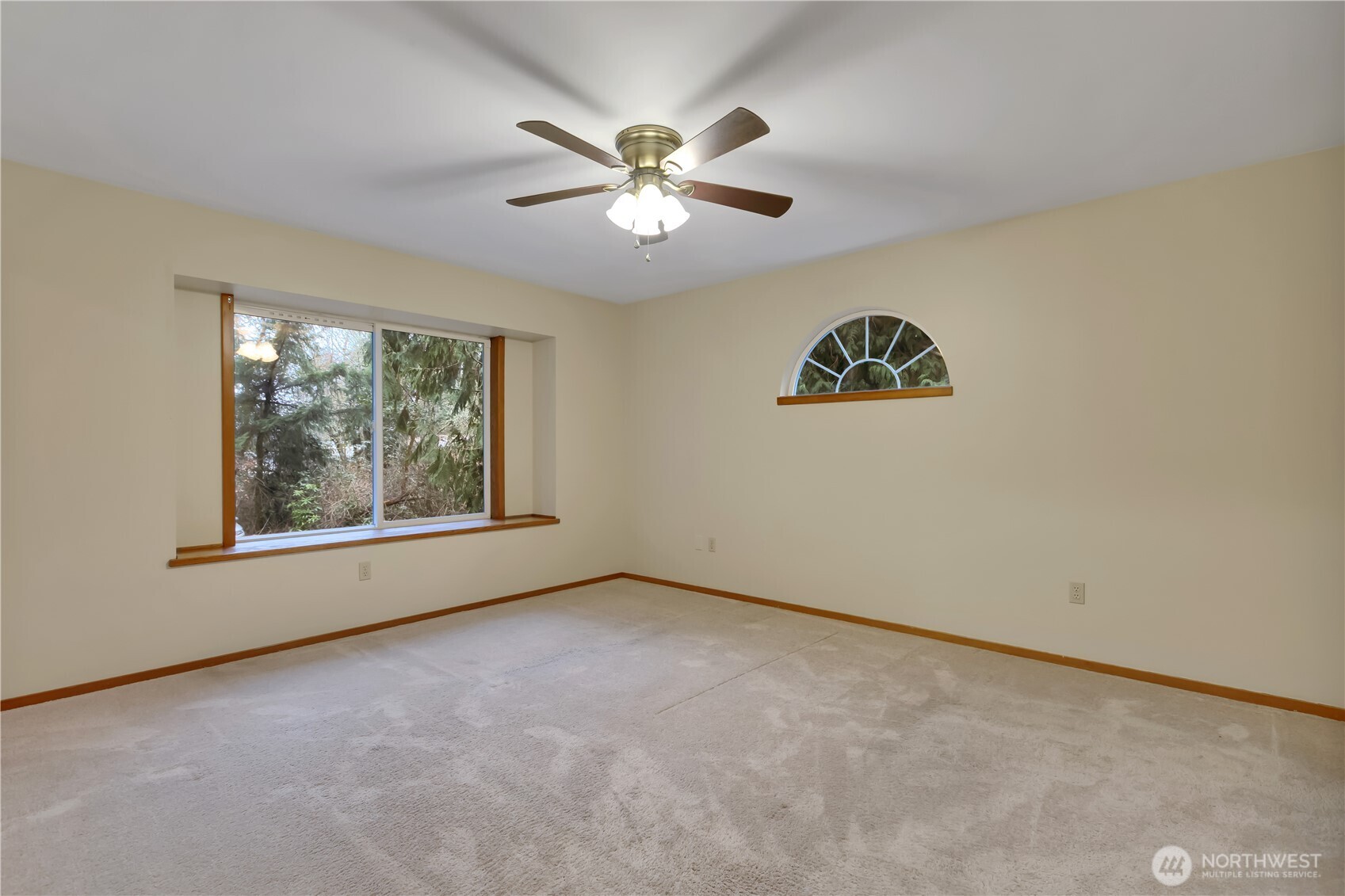 38 Brighton Street Port Hadlock, WA 98339 - Photo 14 of 32 an empty room with windows and fan