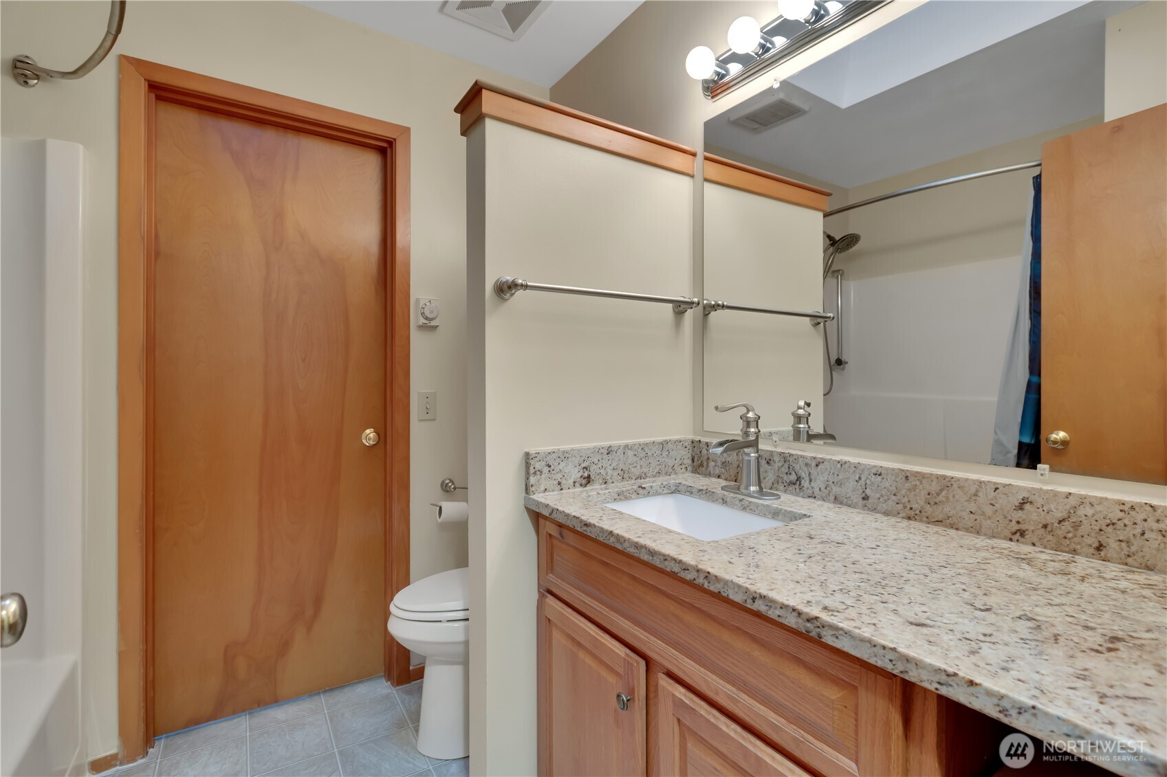 38 Brighton Street Port Hadlock, WA 98339 - Photo 18 of 32 a bathroom with a granite countertop sink toilet and shower