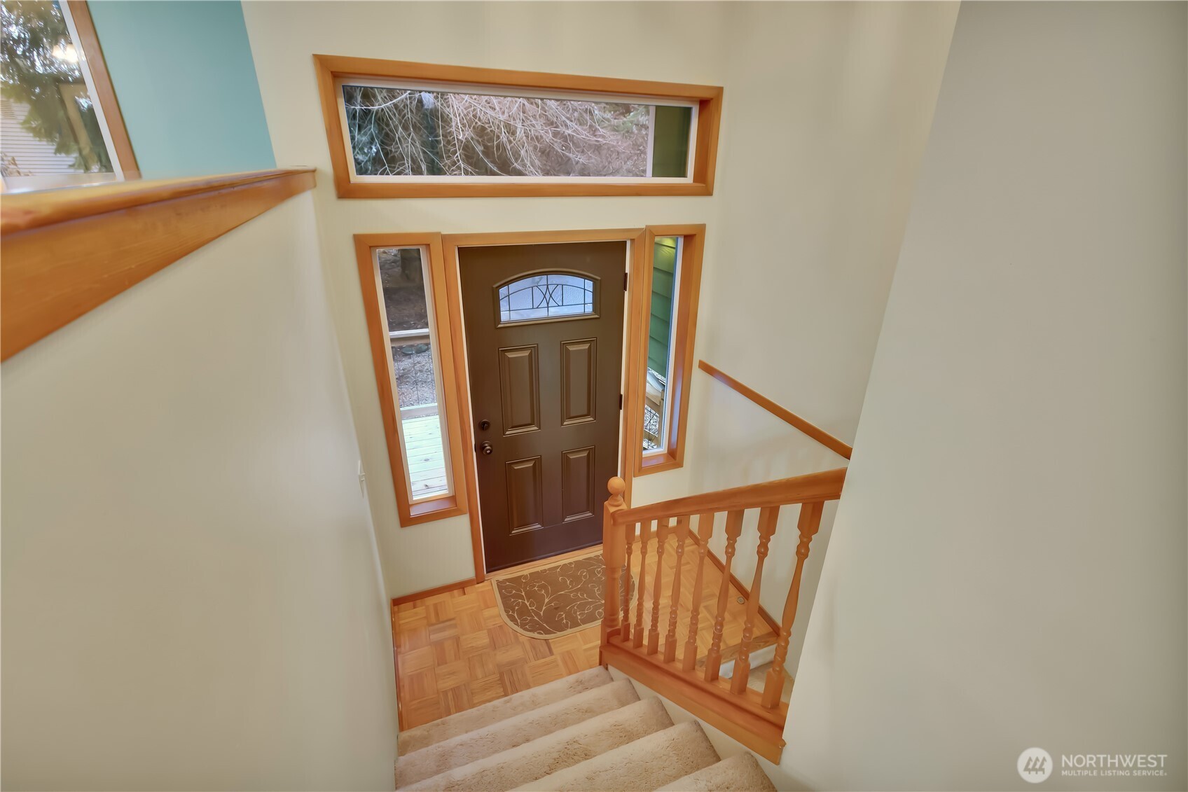 38 Brighton Street Port Hadlock, WA 98339 - Photo 20 of 32 a view of a hallway with wooden floor and a hallway