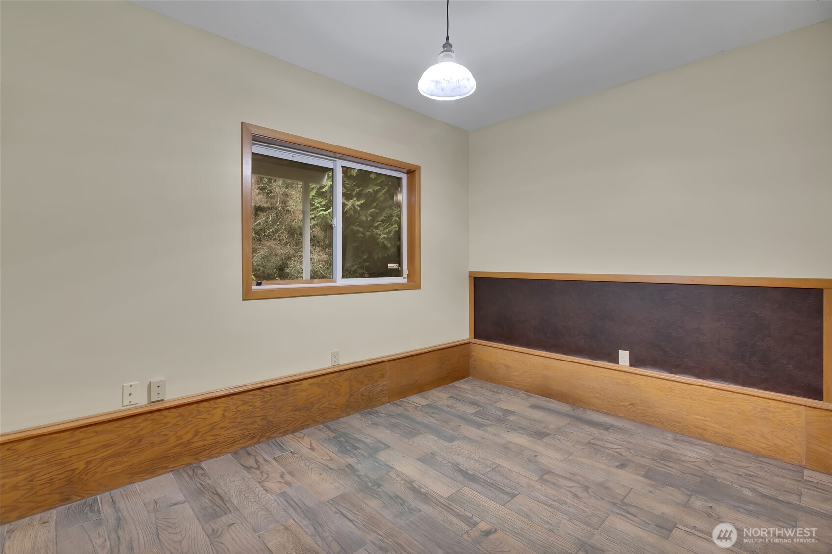 38 Brighton Street Port Hadlock, WA 98339 - Photo 27 of 32 an empty room with wooden floor and windows