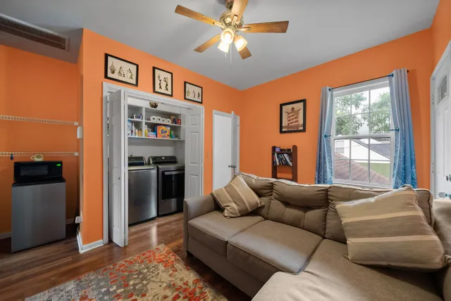 a bathroom with a toilet a sink and a mirror