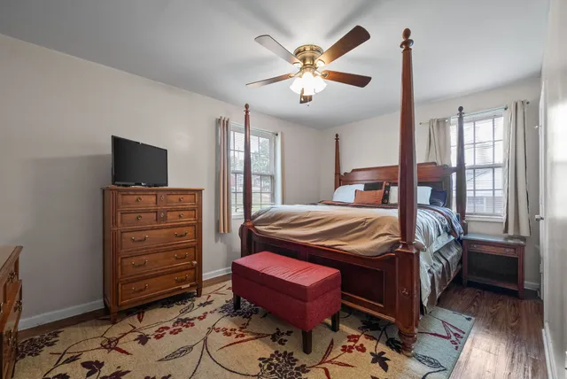 a kitchen with stainless steel appliances granite countertop a refrigerator a stove and a sink