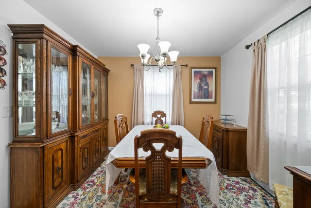 a kitchen with stainless steel appliances granite countertop a stove and a refrigerator