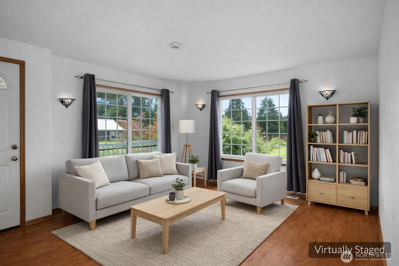 7606 187th Avenue Southwest Rochester, WA 98579 - Photo 4 of 28 a living room with furniture and a large window