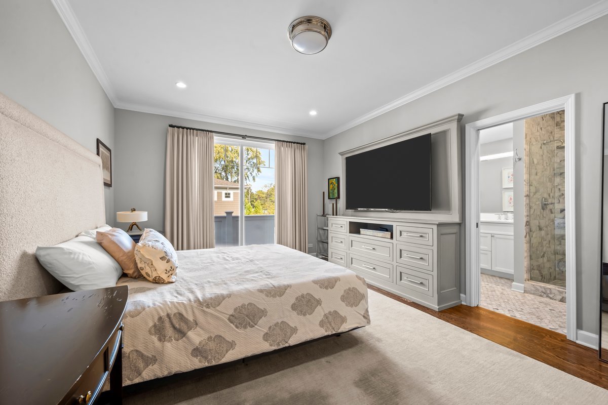 828 Chestnut Street Deerfield, IL 60015 - Photo 11 of 29 a bedroom with a bed and a flat screen tv on dresser