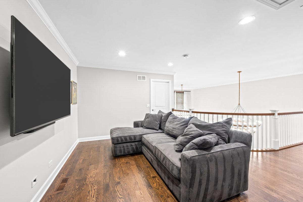 828 Chestnut Street Deerfield, IL 60015 - Photo 15 of 29 a living room with furniture and a flat screen tv
