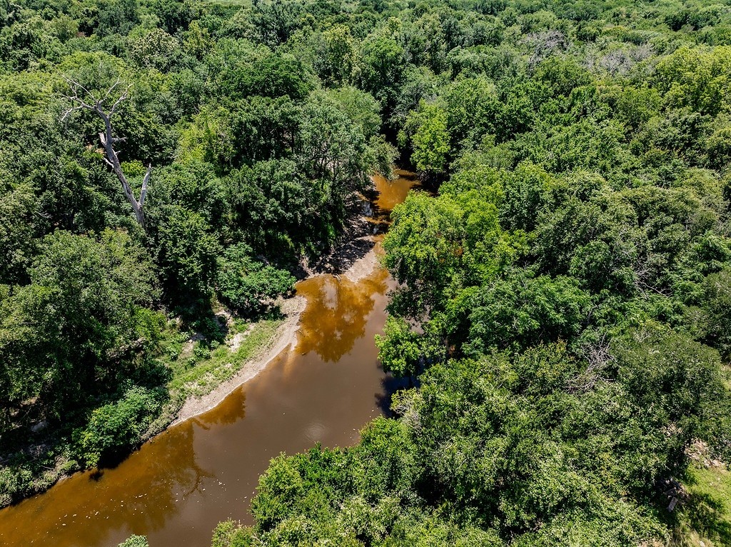 Tbd Bending Road La Grange, TX 78945 - Photo 5 of 13 a view of a lake with a house