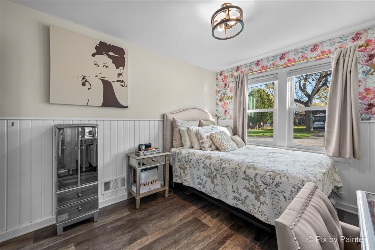 625 South Harrison Street Batavia, IL 60510 - Photo 16 of 43 a bedroom with a bed and a window