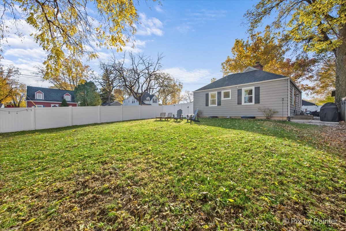 625 South Harrison Street Batavia, IL 60510 - Photo 27 of 43 a view of a yard in front of a house with large trees