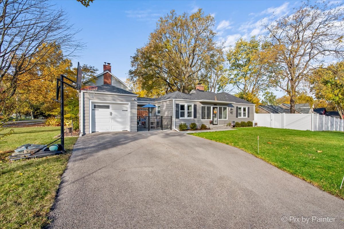 625 South Harrison Street Batavia, IL 60510 - Photo 38 of 43 a view of a house with a big yard and large trees