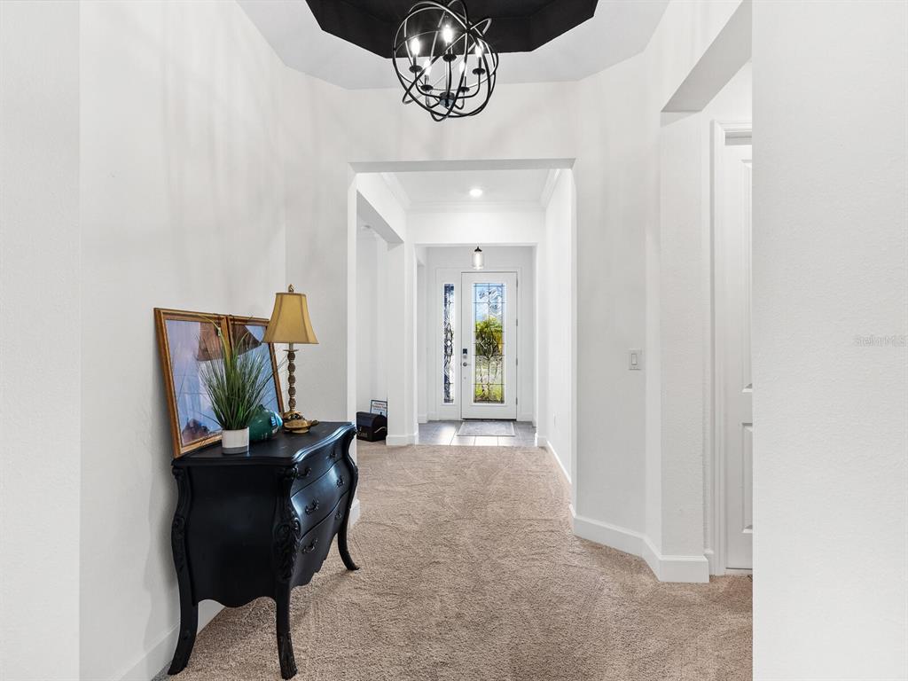 15317 Isla Palma Lane Nokomis, FL 34275 - Photo 2 of 25 a view of a hallway with elevator