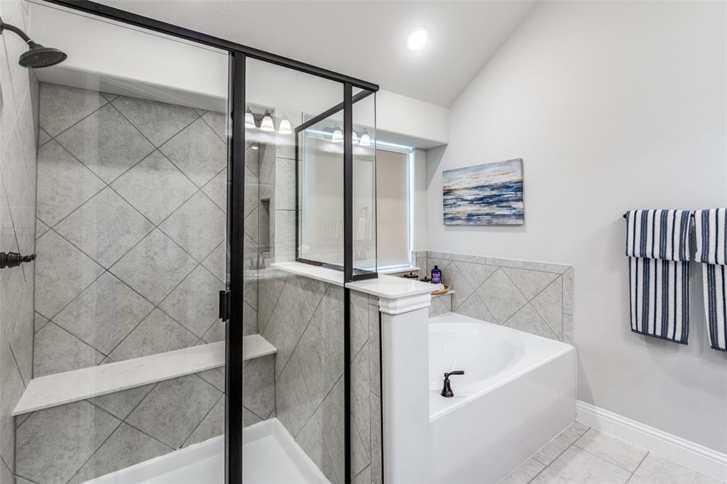 3011 Razorback Street Melissa, TX 75454 - Photo 20 of 25 a bathroom with a bathtub and shower