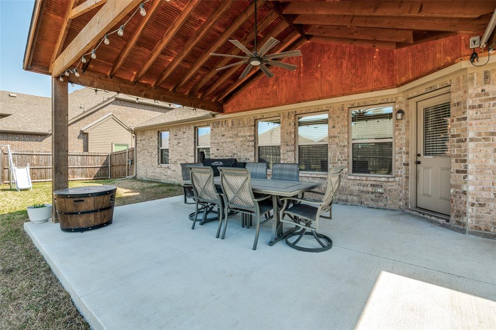 3011 Razorback Street Melissa, TX 75454 - Photo 21 of 25 a view of a patio with table and chairs