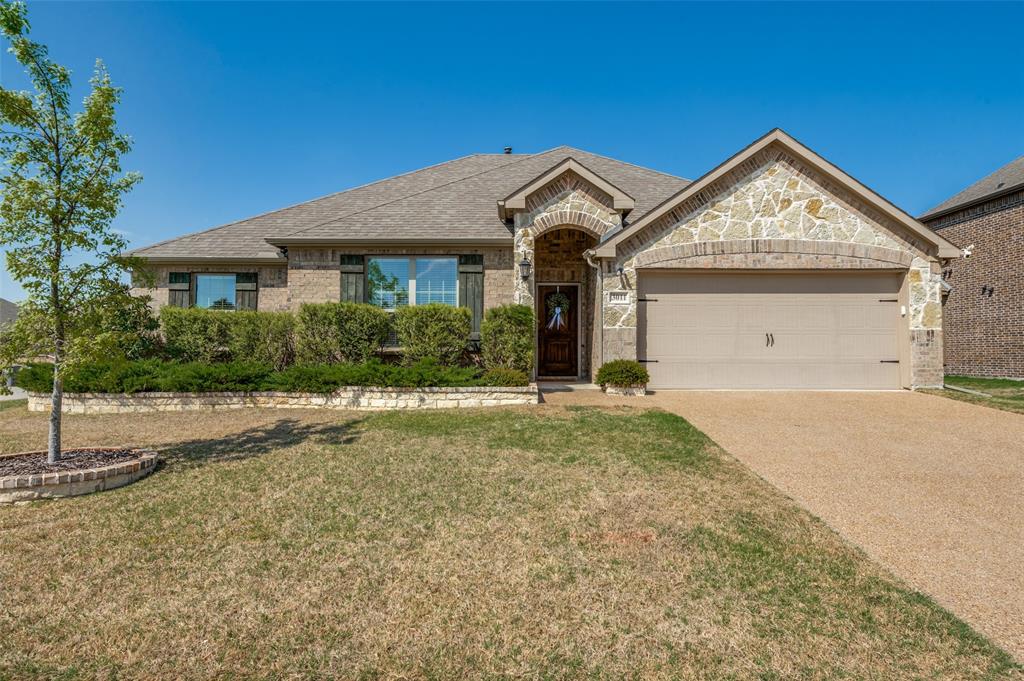 3011 Razorback Street Melissa, TX 75454 - Photo 23 of 25 a front view of a house with garden