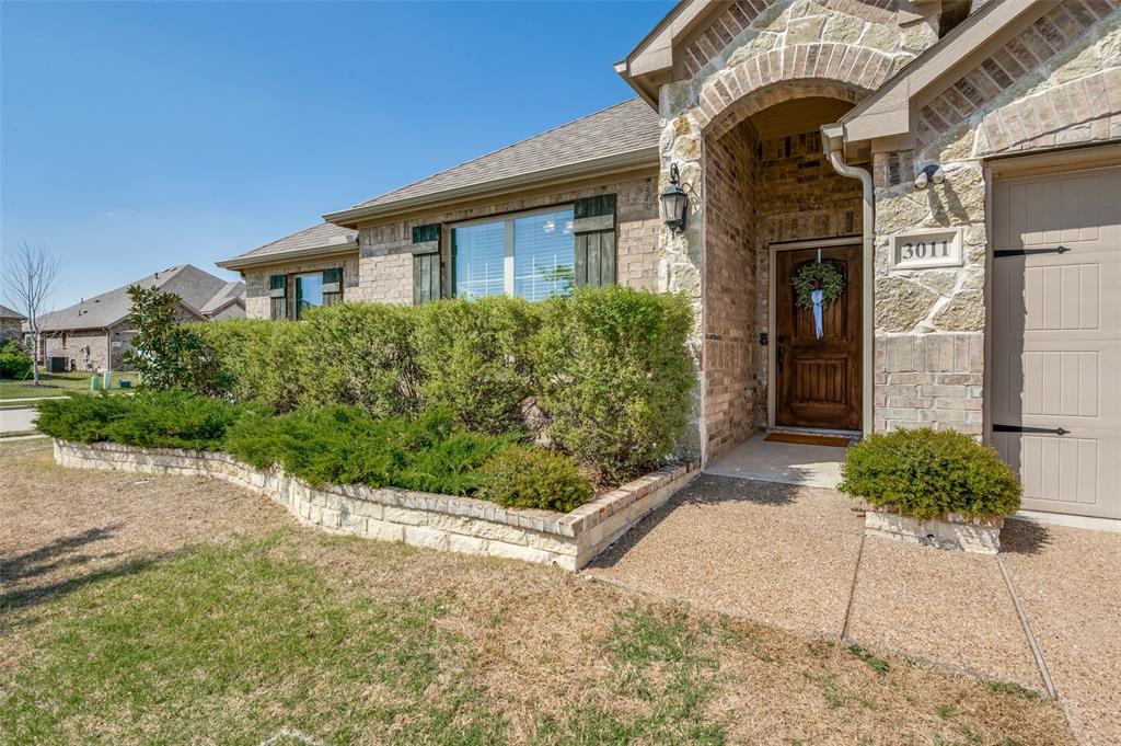 3011 Razorback Street Melissa, TX 75454 - Photo 24 of 25 a front view of a house with garden