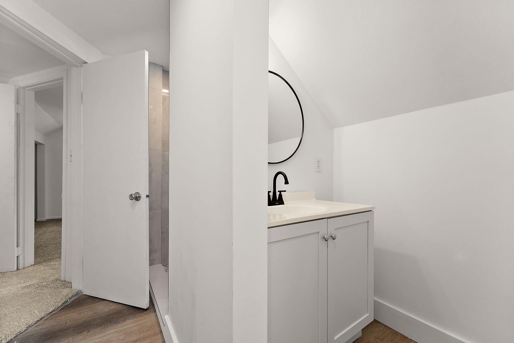 107 Franklin Street Porter, IN 46304 - Photo 16 of 22 a bathroom with a sink and mirror